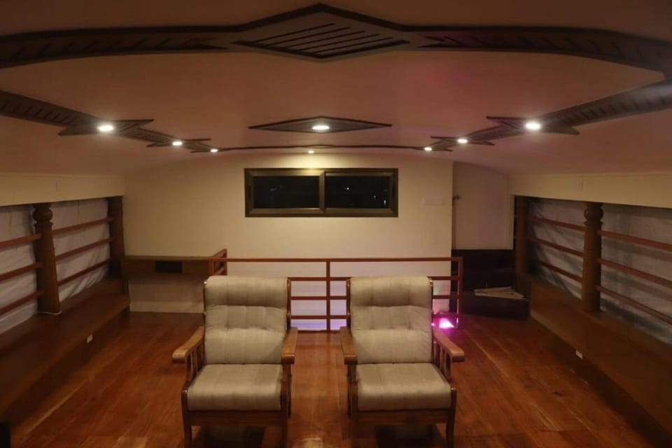 Sacred River Houseboats Docked boat in Alappuzha