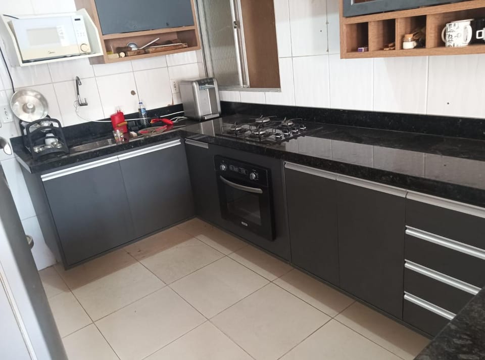 Kitchen or kitchenette, dishwasher, stove