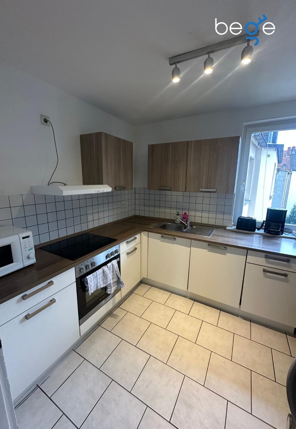 Kitchen or kitchenette, microwave, stove, kitchen