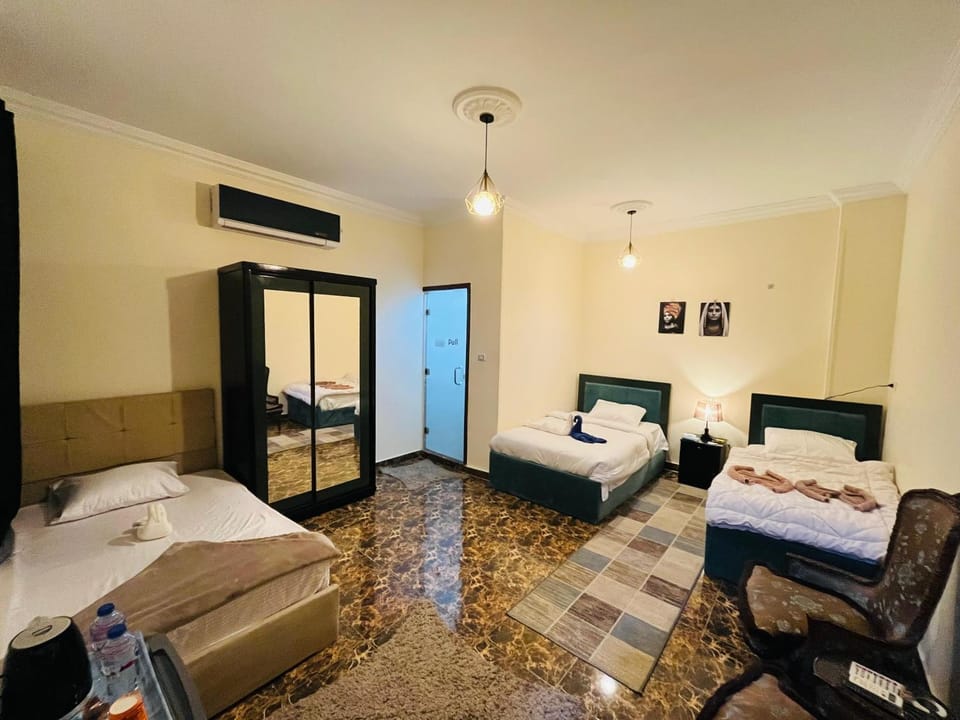 Photo of the whole room, Bedroom, towels, wardrobe, air conditioner