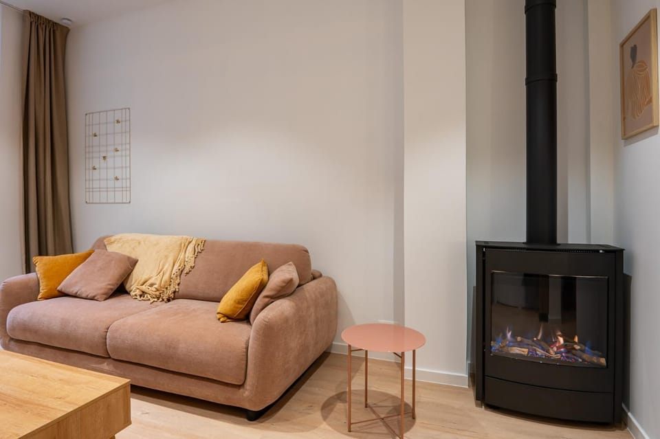 Stylish Coastal Apartment with Fireplace & Terrace in Oostende Apartment in Ostend
