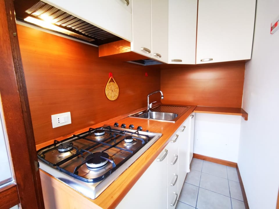 Kitchen or kitchenette, stove