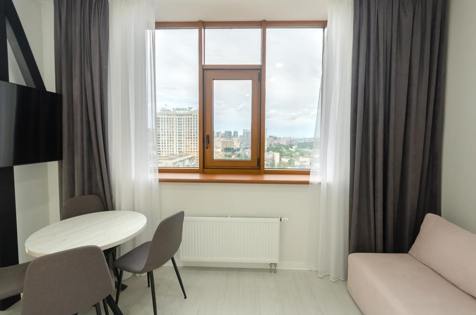 Living room, Dining area, City view, heating