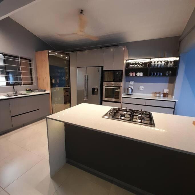 Kitchen or kitchenette, oven, stove
