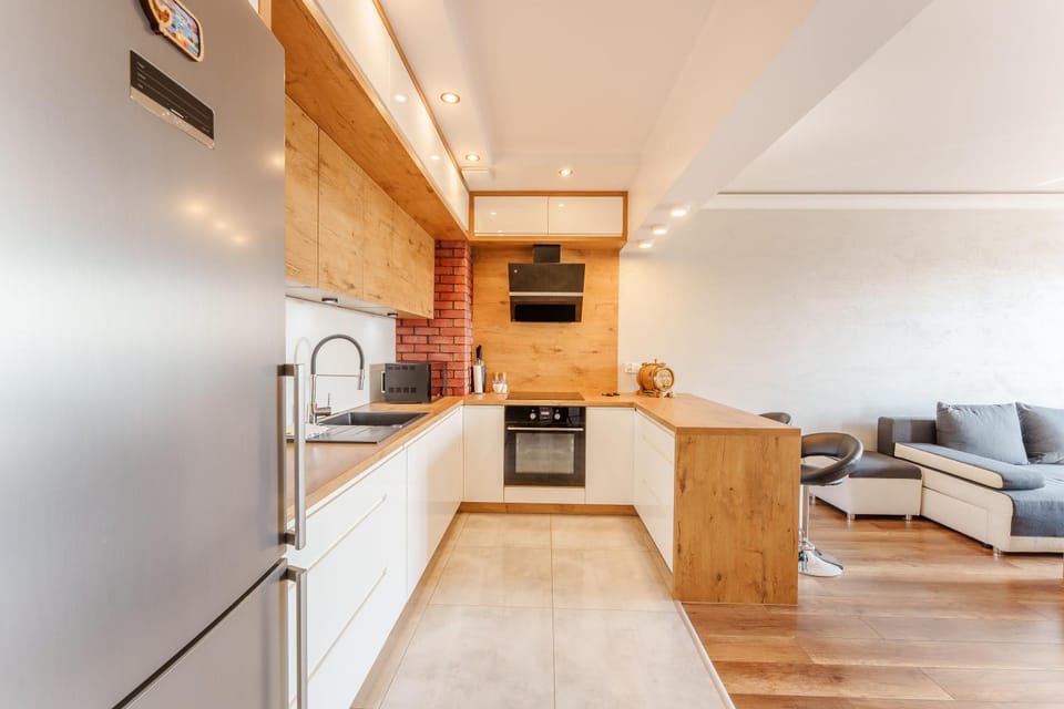 Kitchen or kitchenette, Living room, Seating area, dishwasher, oven, stove, toaster