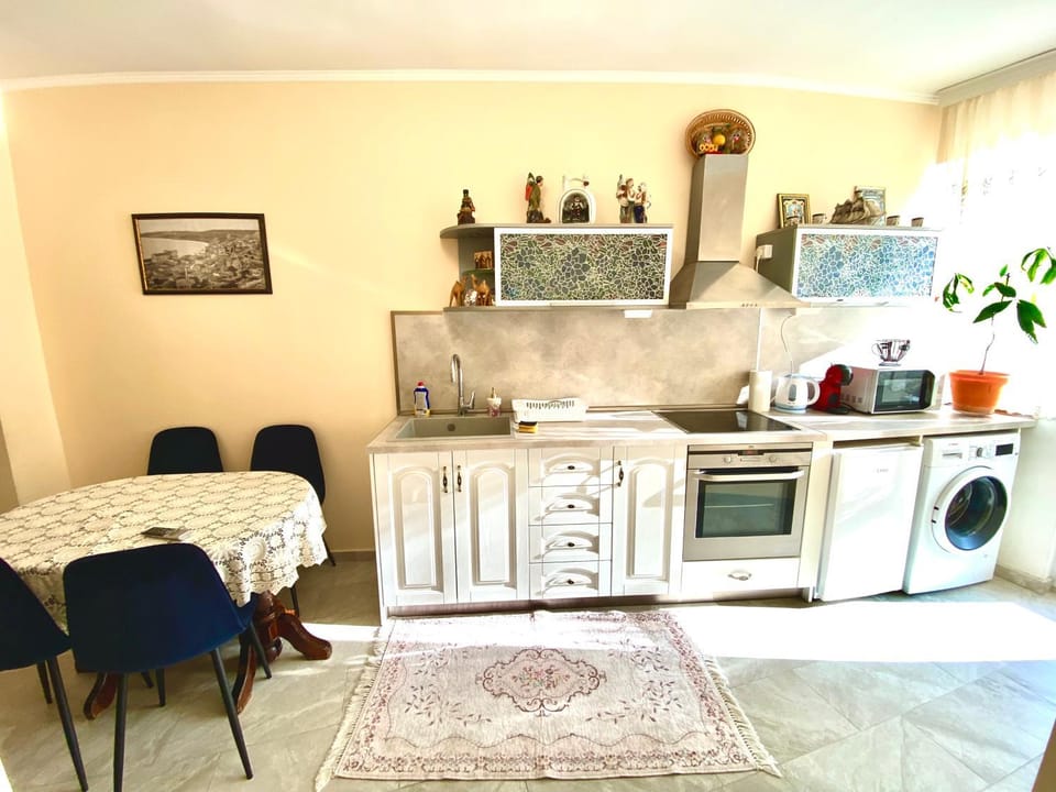 Kitchen or kitchenette, Living room, Dining area, oven, stove, washing machine, dryer