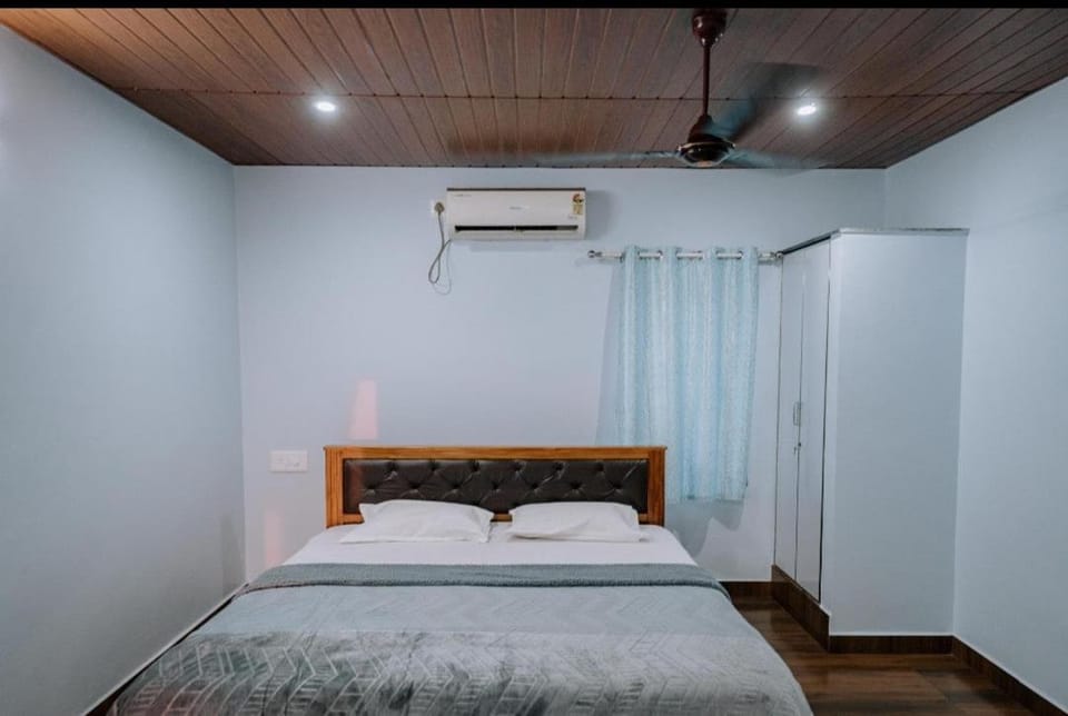 Bed, air conditioner