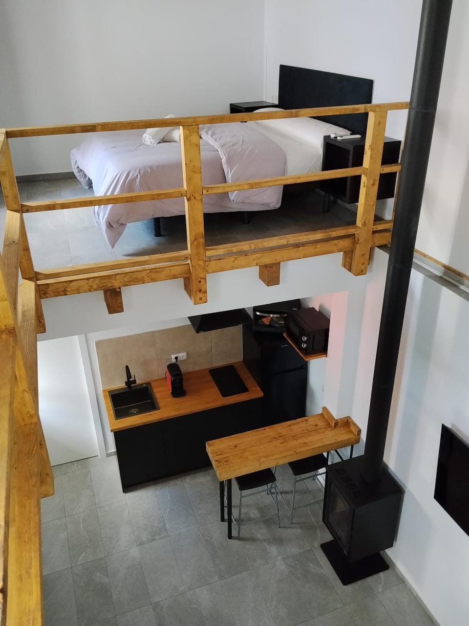 Bed, Kitchen or kitchenette, fireplace