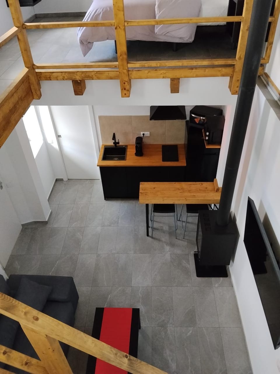 Bed, Kitchen or kitchenette, fireplace, stove