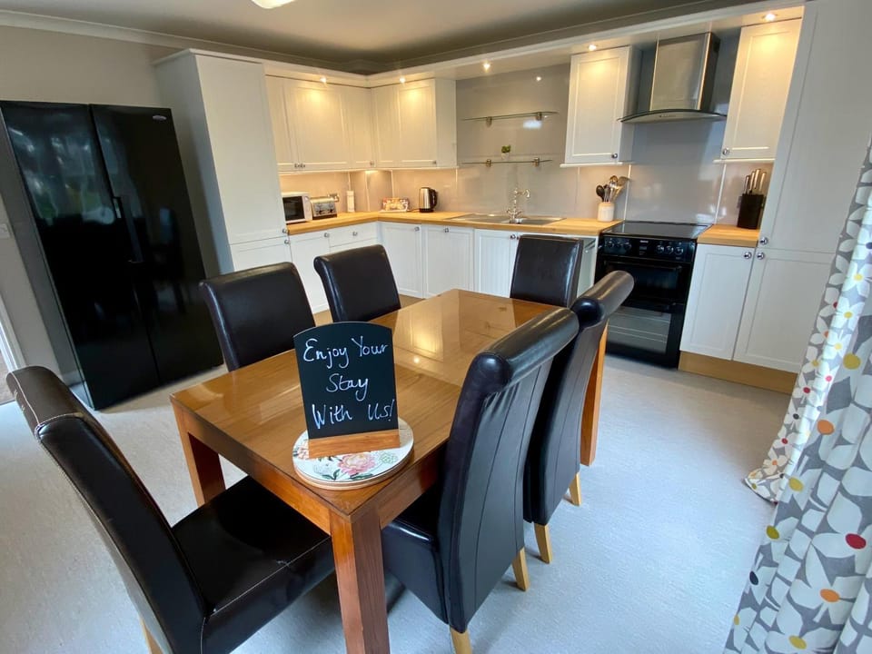 Kitchen or kitchenette, Dining area, microwave, oven, stove, toaster, kitchen