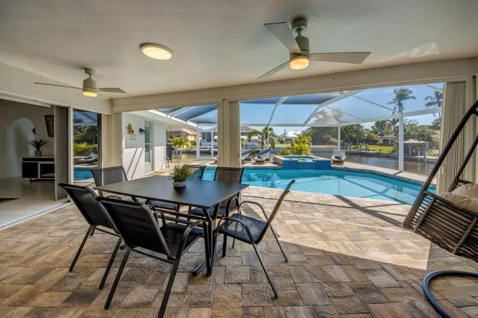 Walk to Yacht Club Beach, Pool, Spa & Gulf Access Waterfront Escape - Cozy Corner - Roelens House in Cape Coral