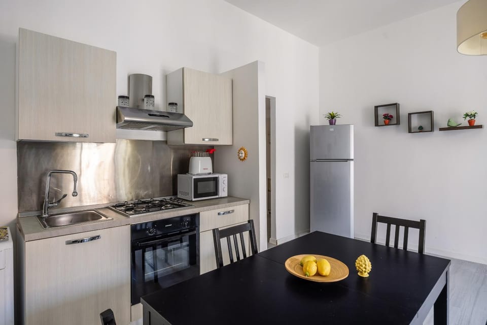 Kitchen or kitchenette, oven, stove
