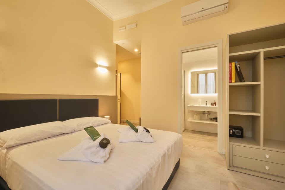 Photo of the whole room, Bedroom, furniture, locker, safe, towels, air conditioner