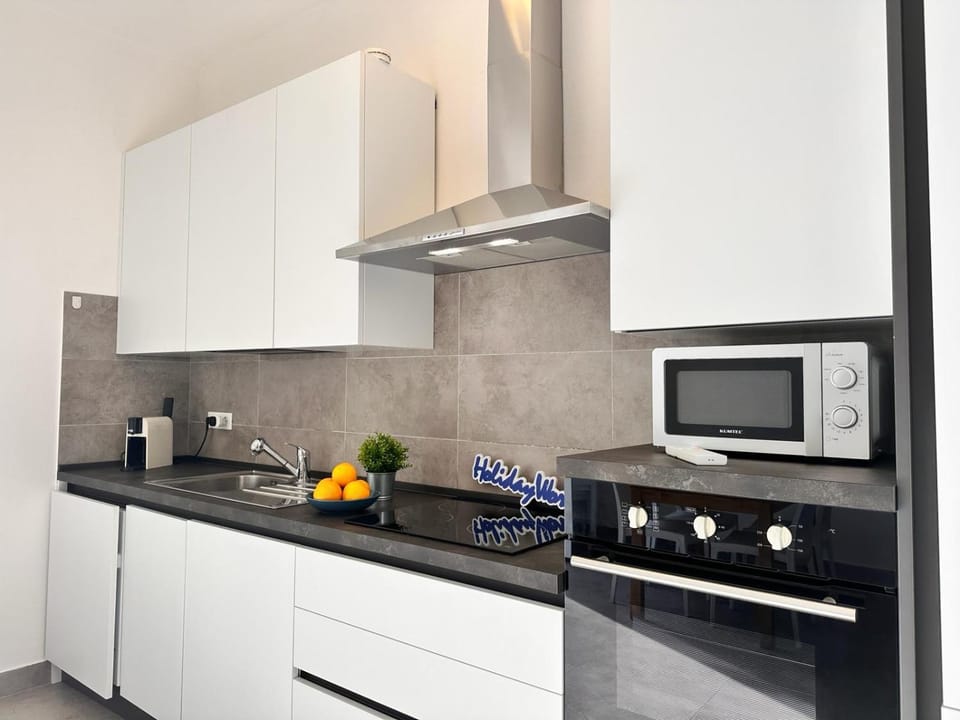 Kitchen or kitchenette, oven