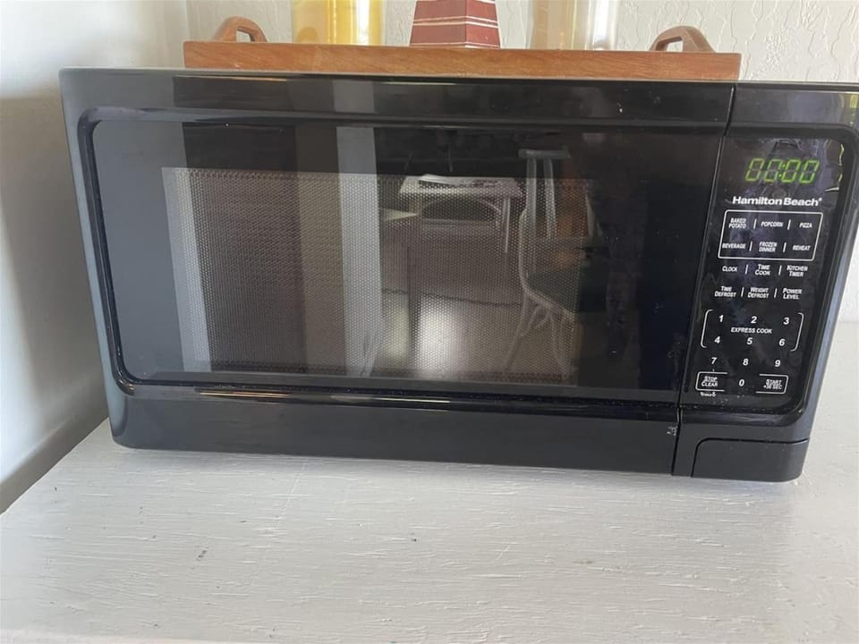 Kitchen or kitchenette, microwave