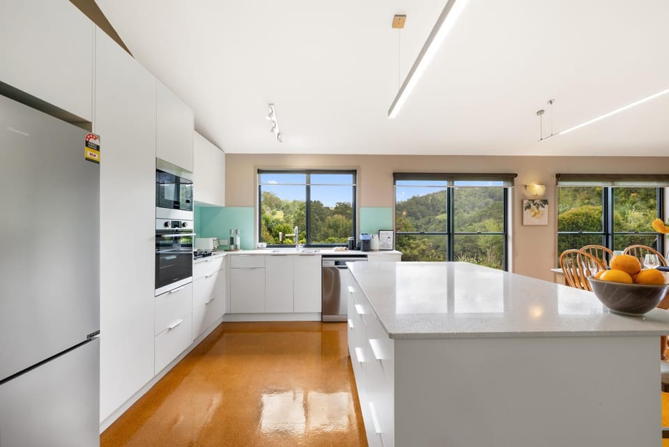 Kitchen or kitchenette, dishwasher, oven, stove