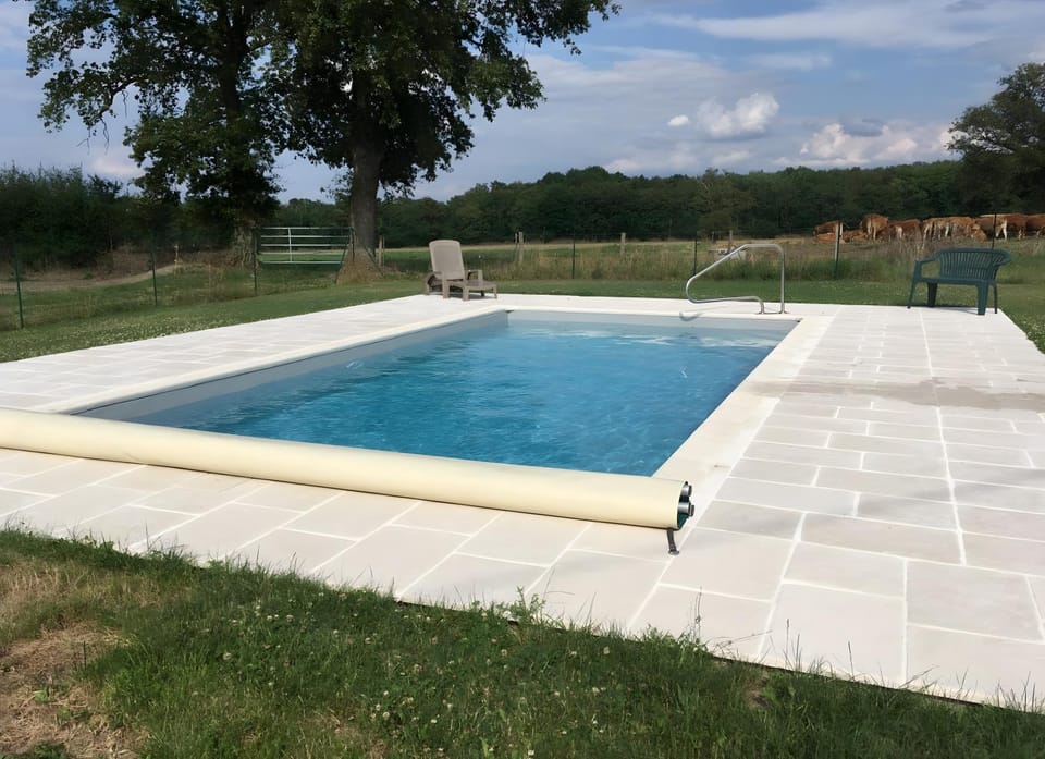 Property building, Living room, Swimming pool