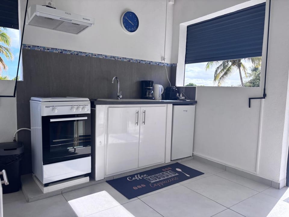 Kitchen or kitchenette, oven, stove, toaster
