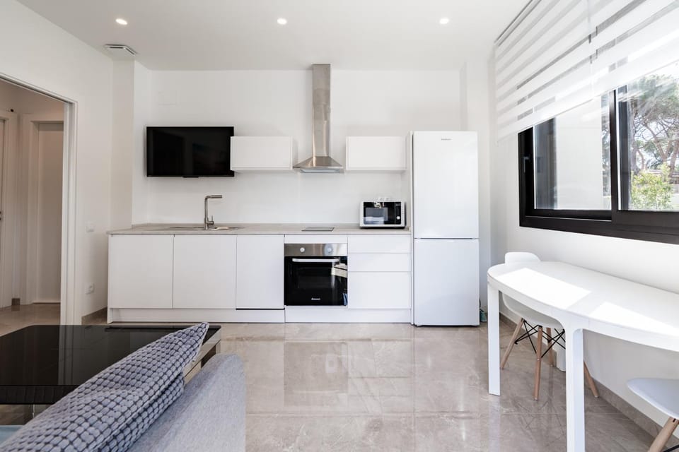 TV and multimedia, Kitchen or kitchenette, Living room, Seating area, dishwasher, oven, stove