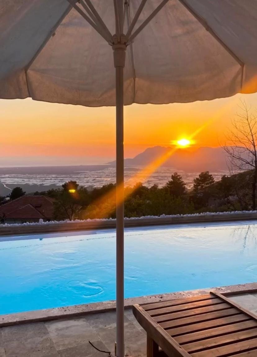 Patio, Natural landscape, Pool view, Sea view, Swimming pool, Sunset, sunbed