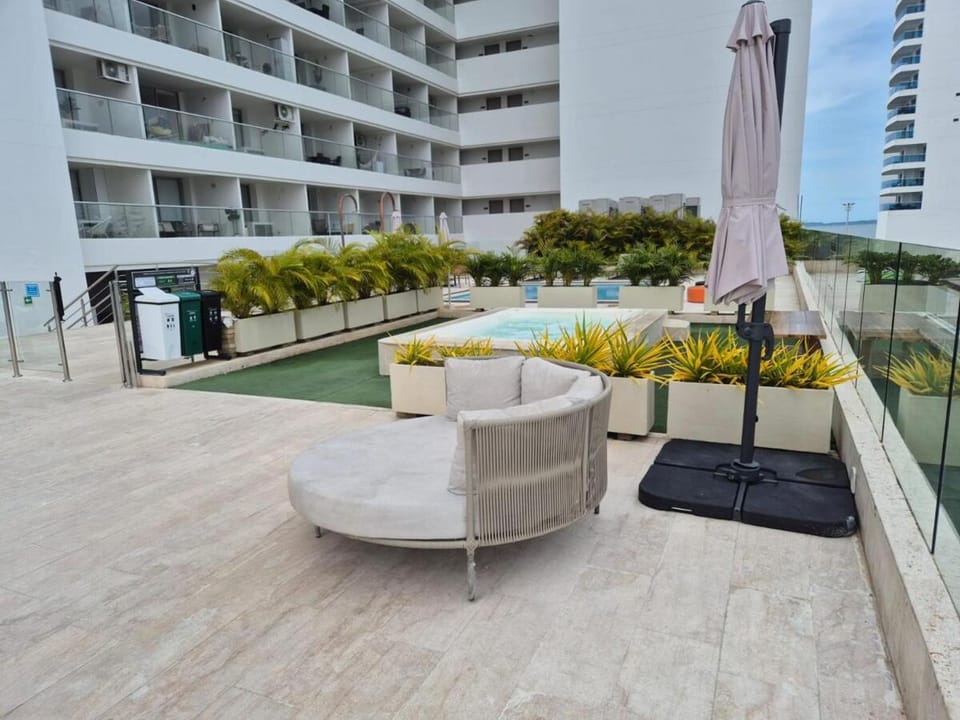Property building, Patio, Day, Garden, Hot Tub, View (from property/room), Garden view, Pool view, sunbed