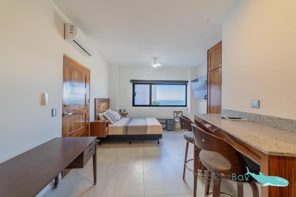 Studio pool steps to Malecon Apartment in La Paz