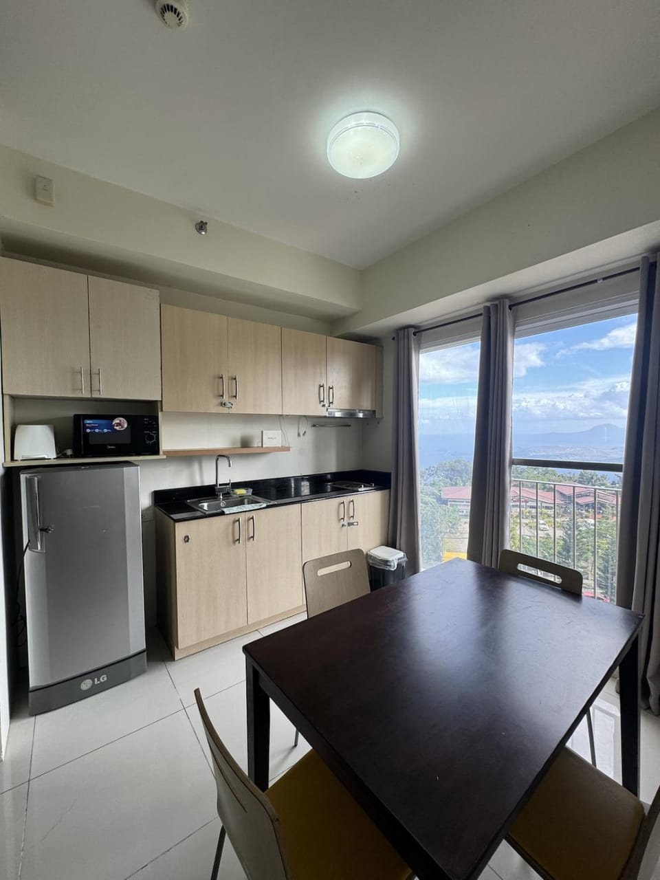 Modern Neoclassical Studio w Taal View at SMDC Wind Apartment in Tagaytay