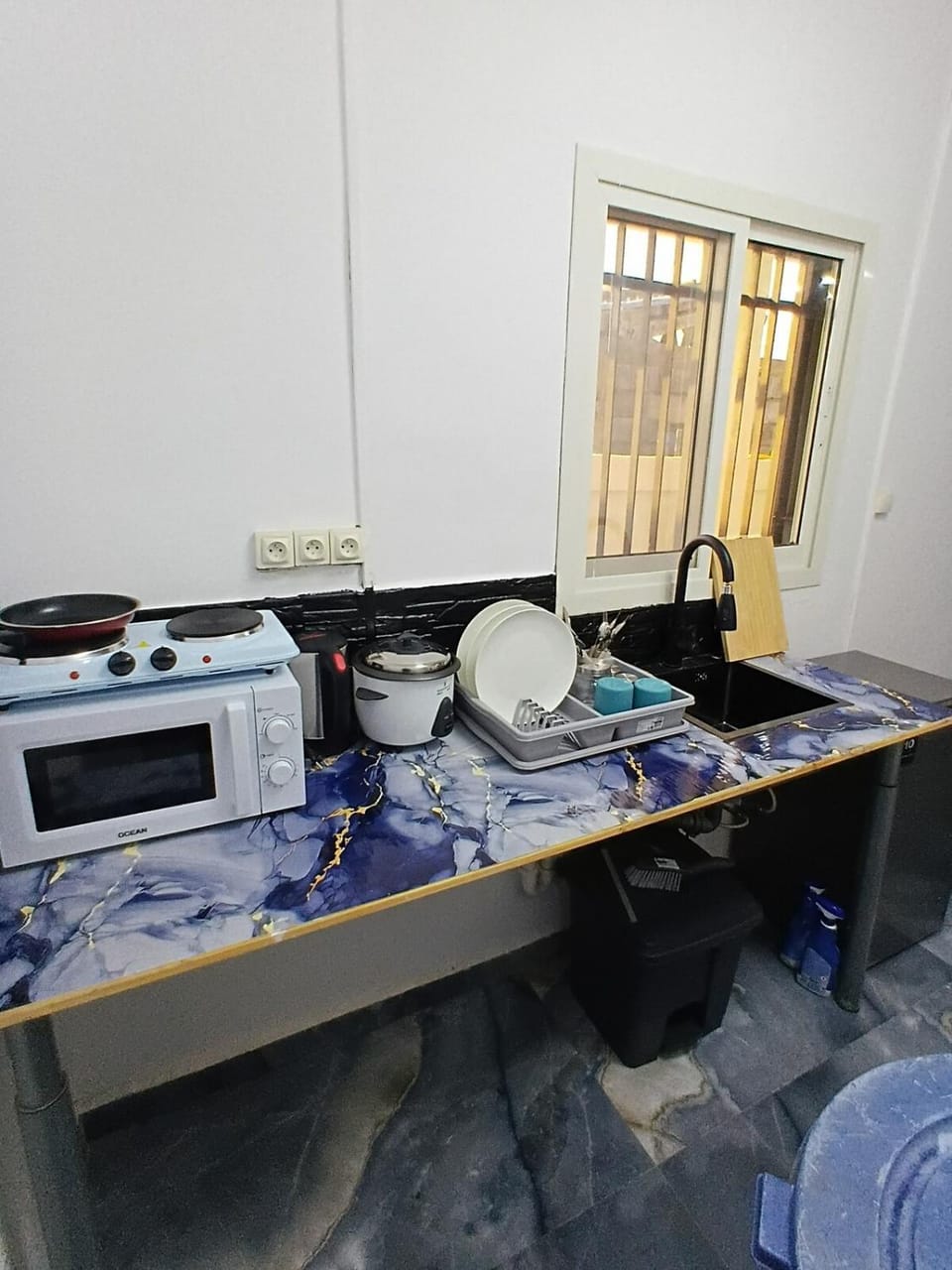 Kitchen or kitchenette, stove