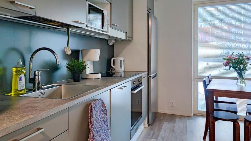 Kolmio parkkipaikalla - Perheet - Ratikka Apartment in Finland