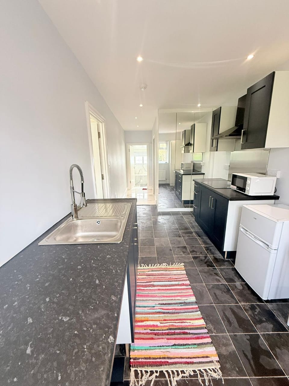 Kitchen or kitchenette, oven, stove