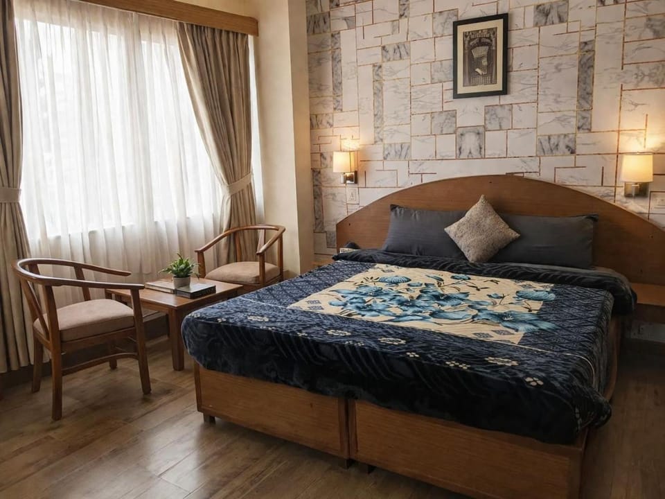 Bed, Seating area, Bedroom