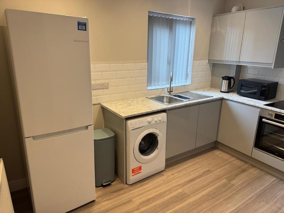 microwave, washing machine, kitchen