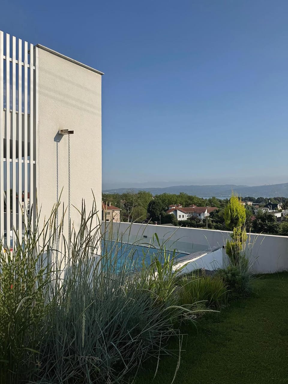Property building, Day, Natural landscape, Pool view, Swimming pool