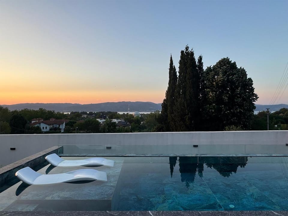 Natural landscape, Mountain view, Pool view, Swimming pool, Sunset, sunbed