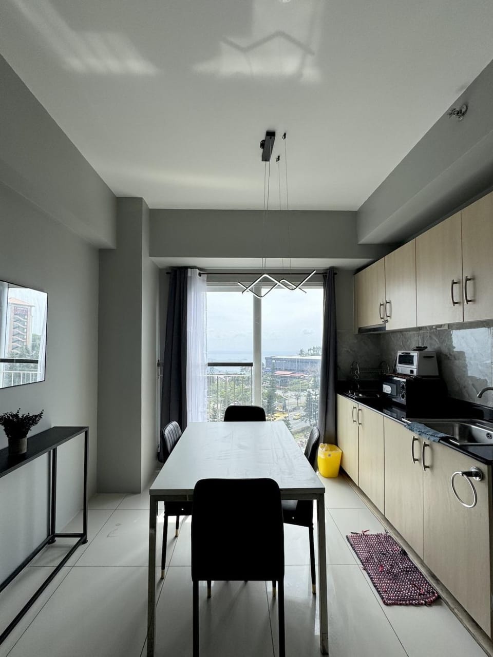 Monochrome Bauhaus Studio with Lake View at SMDC Wind Apartment in Tagaytay