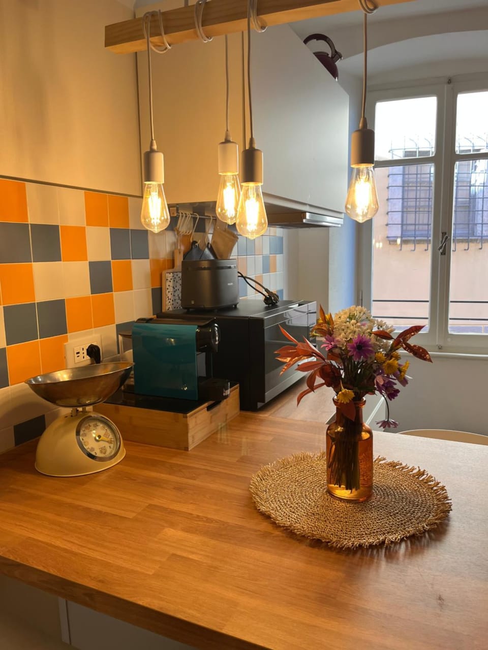 Kitchen or kitchenette, microwave, stove, toaster