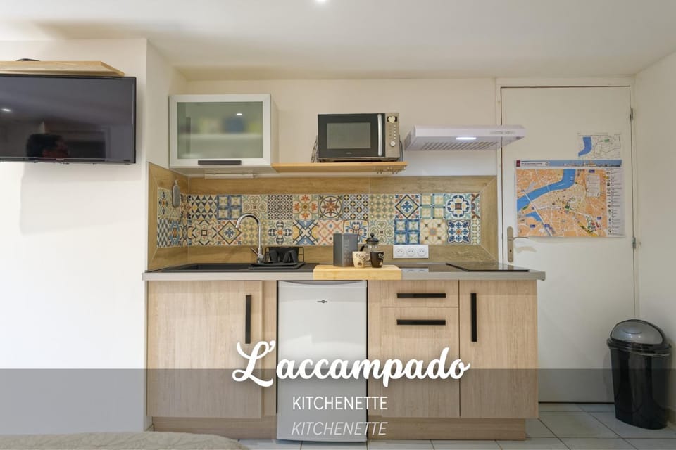 Kitchen or kitchenette, microwave, stove