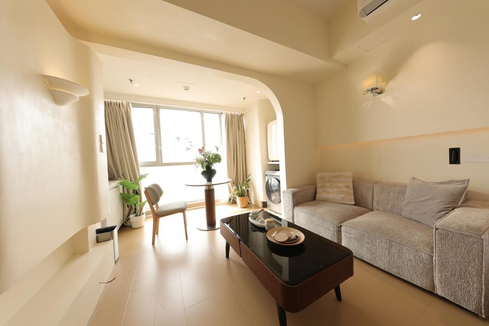 Bed, Living room, Seating area, Bedroom