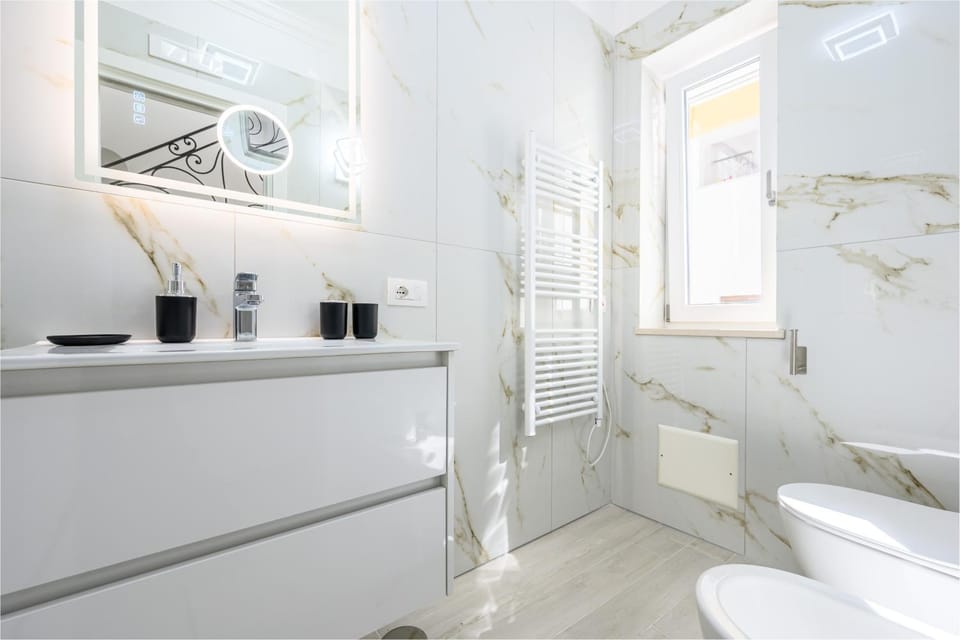 Shower, Toilet, Bathroom, bidet, hair dryier, towels