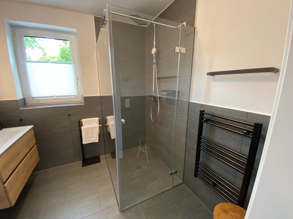 Shower, Toilet, Bathroom, hair dryier, towels
