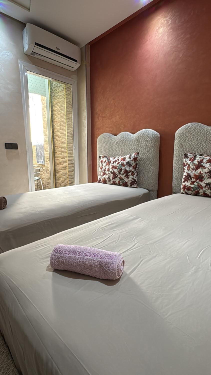 Bed, Balcony/Terrace, Photo of the whole room, Bedroom, dishwasher, towels, air conditioner