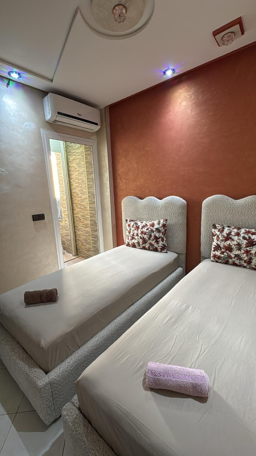 Bed, Photo of the whole room, Bedroom, towels, air conditioner