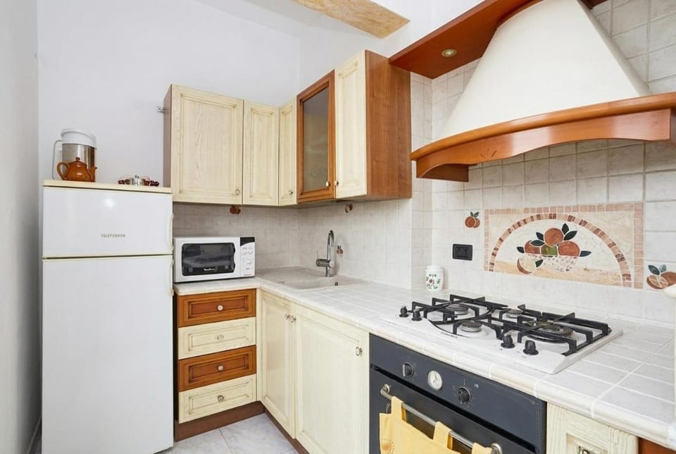 Kitchen or kitchenette, stove, kitchen
