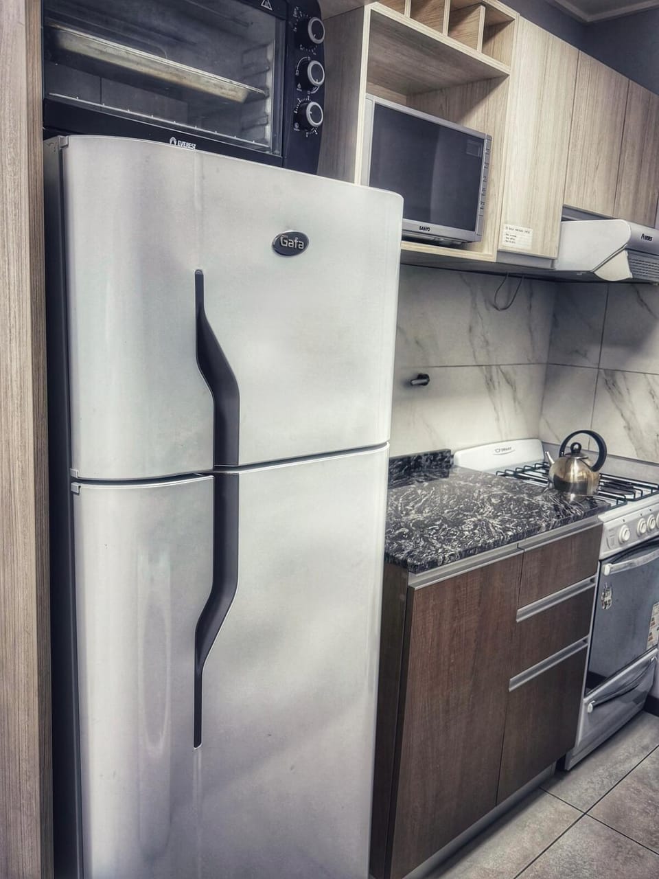 Kitchen or kitchenette, oven
