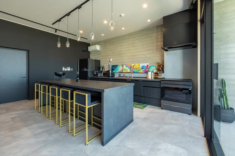 Kitchen or kitchenette, dishwasher, oven, stove