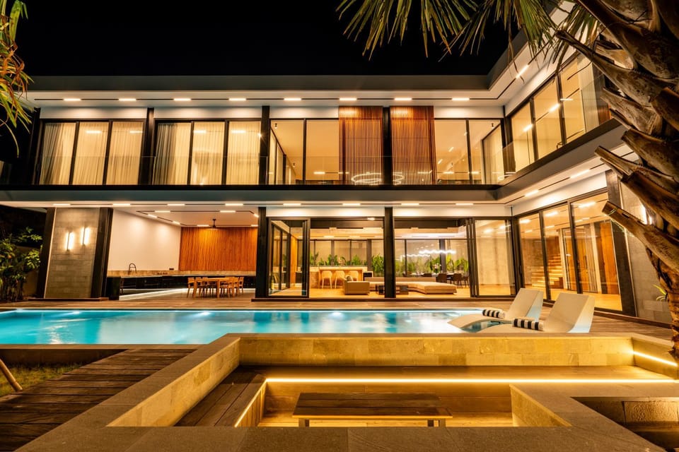 Property building, Patio, Night, Pool view, Swimming pool, sunbed