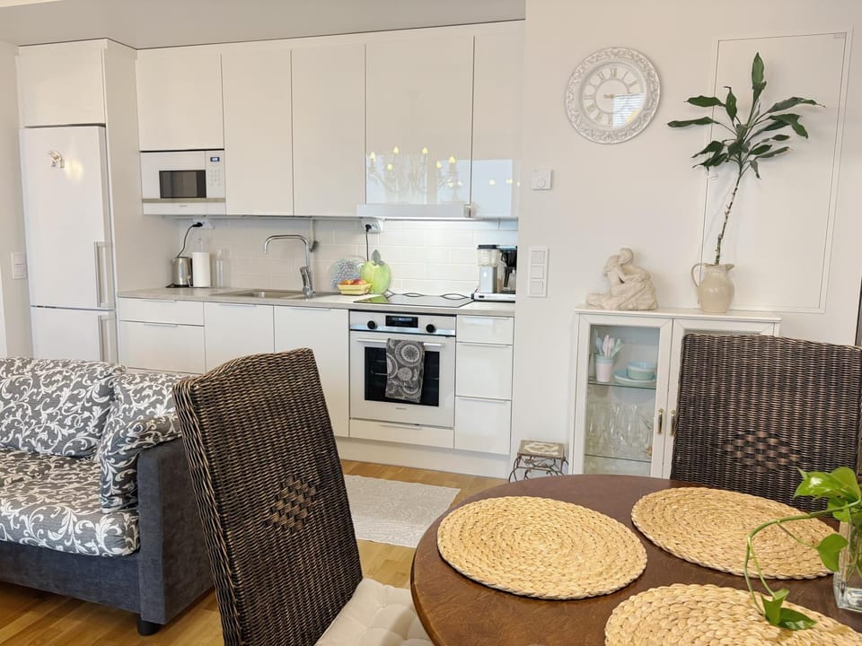 Dining area, dishwasher, microwave, oven, kitchen