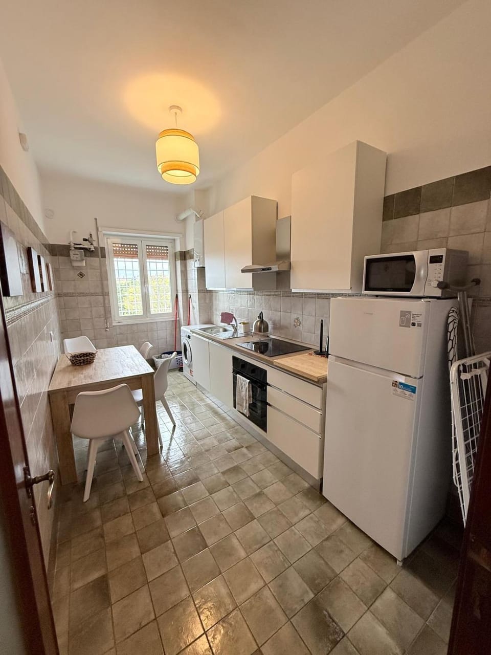 Kitchen or kitchenette, dishwasher, oven, stove, toaster