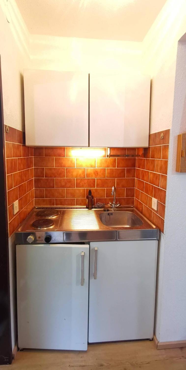 Kitchen or kitchenette, stove