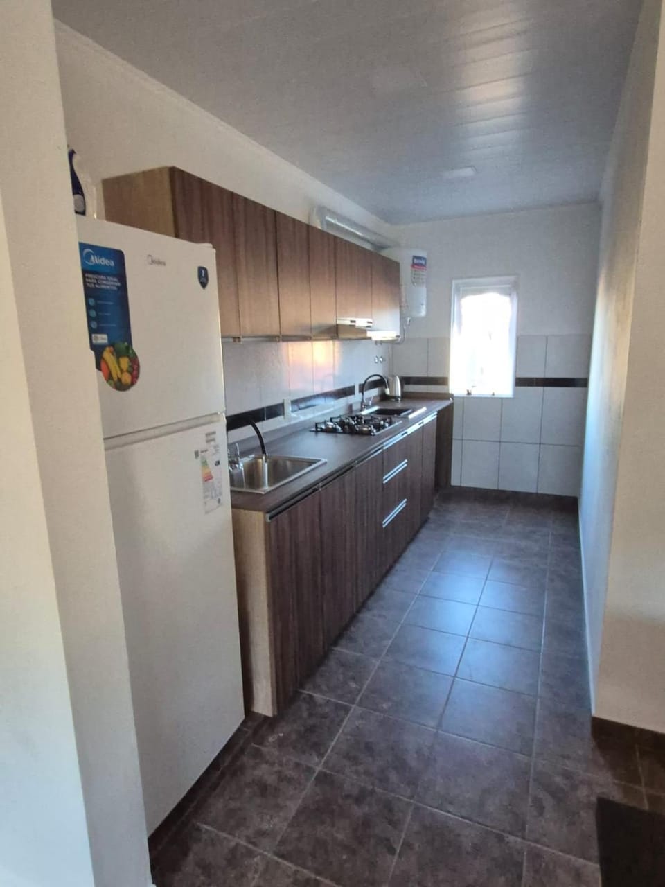 Kitchen or kitchenette, stove